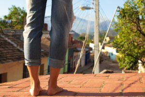 close up of female feets on the roof