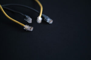 a minimalist display of ethernet cords, crucial for establishing reliable and secure network connections in both home and office settings.