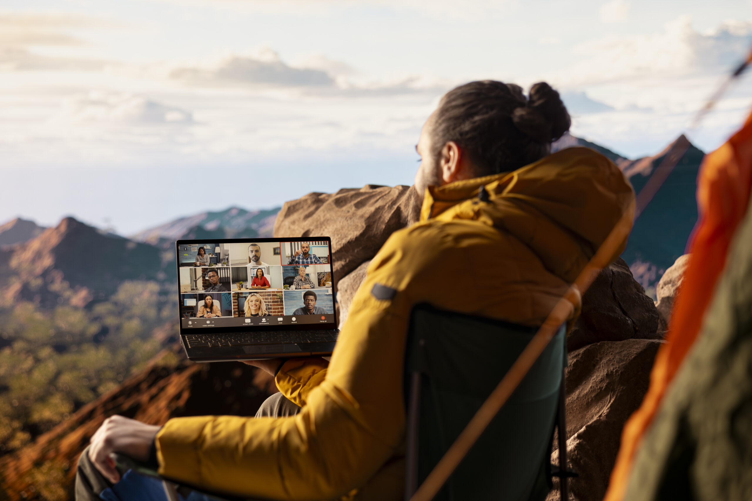 business employee uses high speed internet connection on mountain top