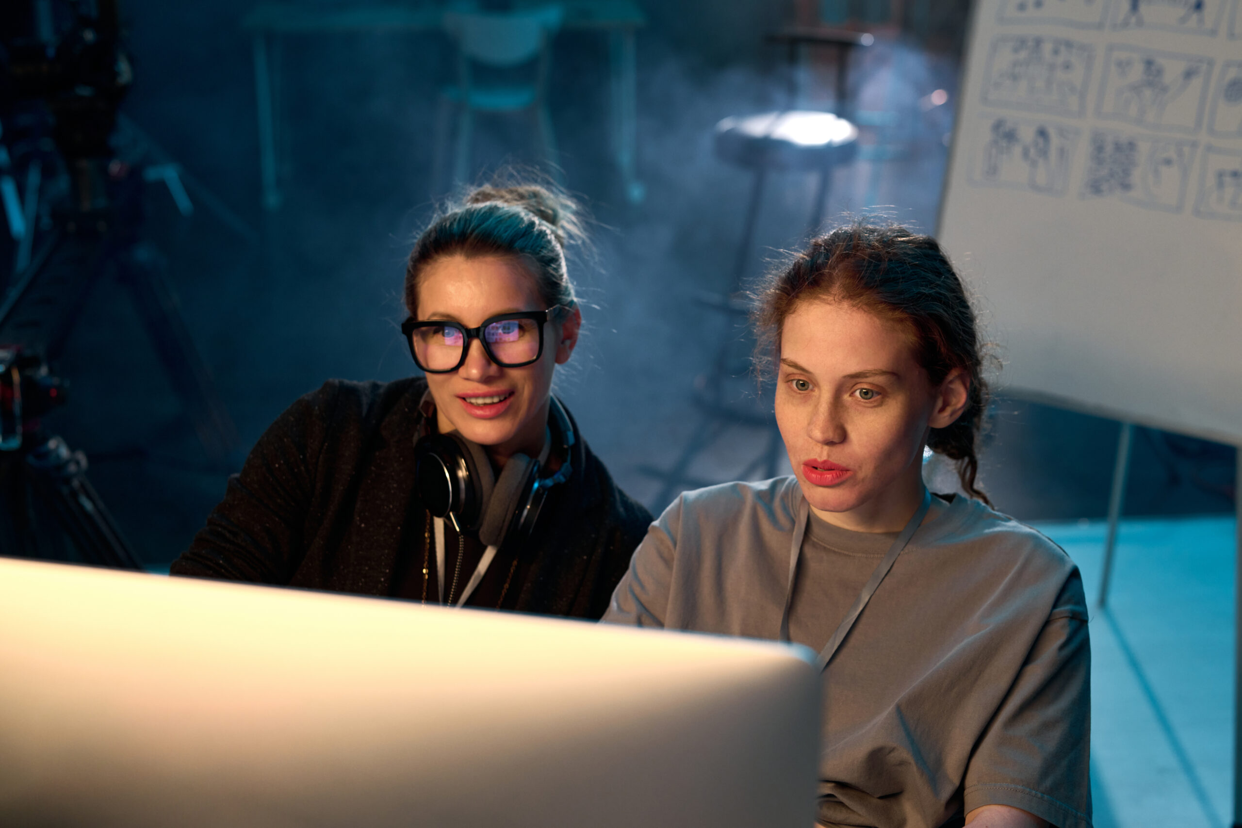 two women in video production crew