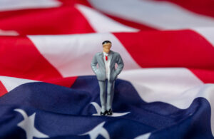 miniature figure of a male politician on usa flag