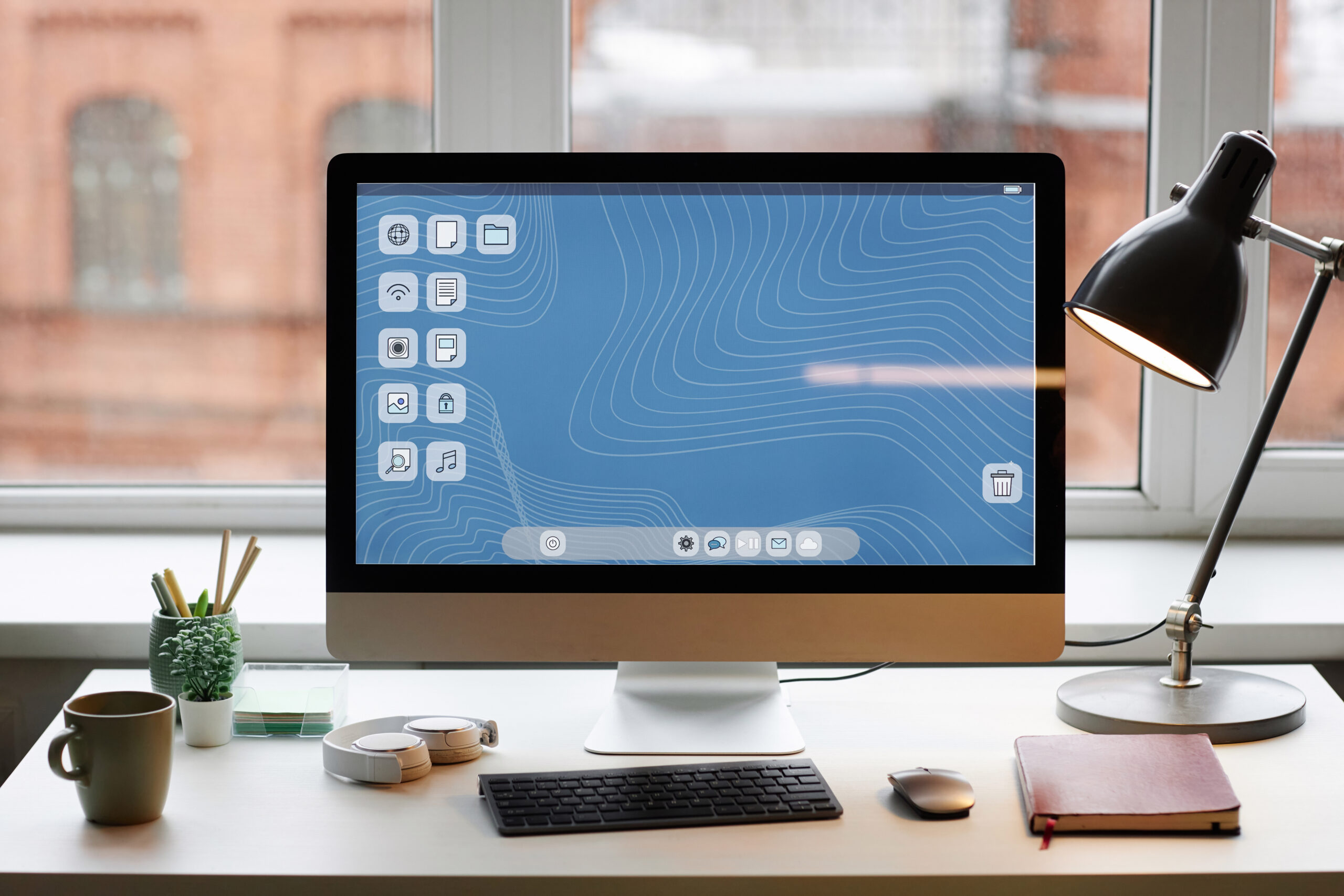 pc computer on desk setup against window