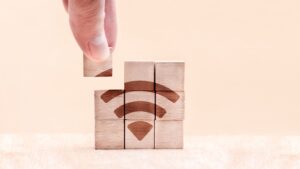 wooden puzzle with wi fi icon