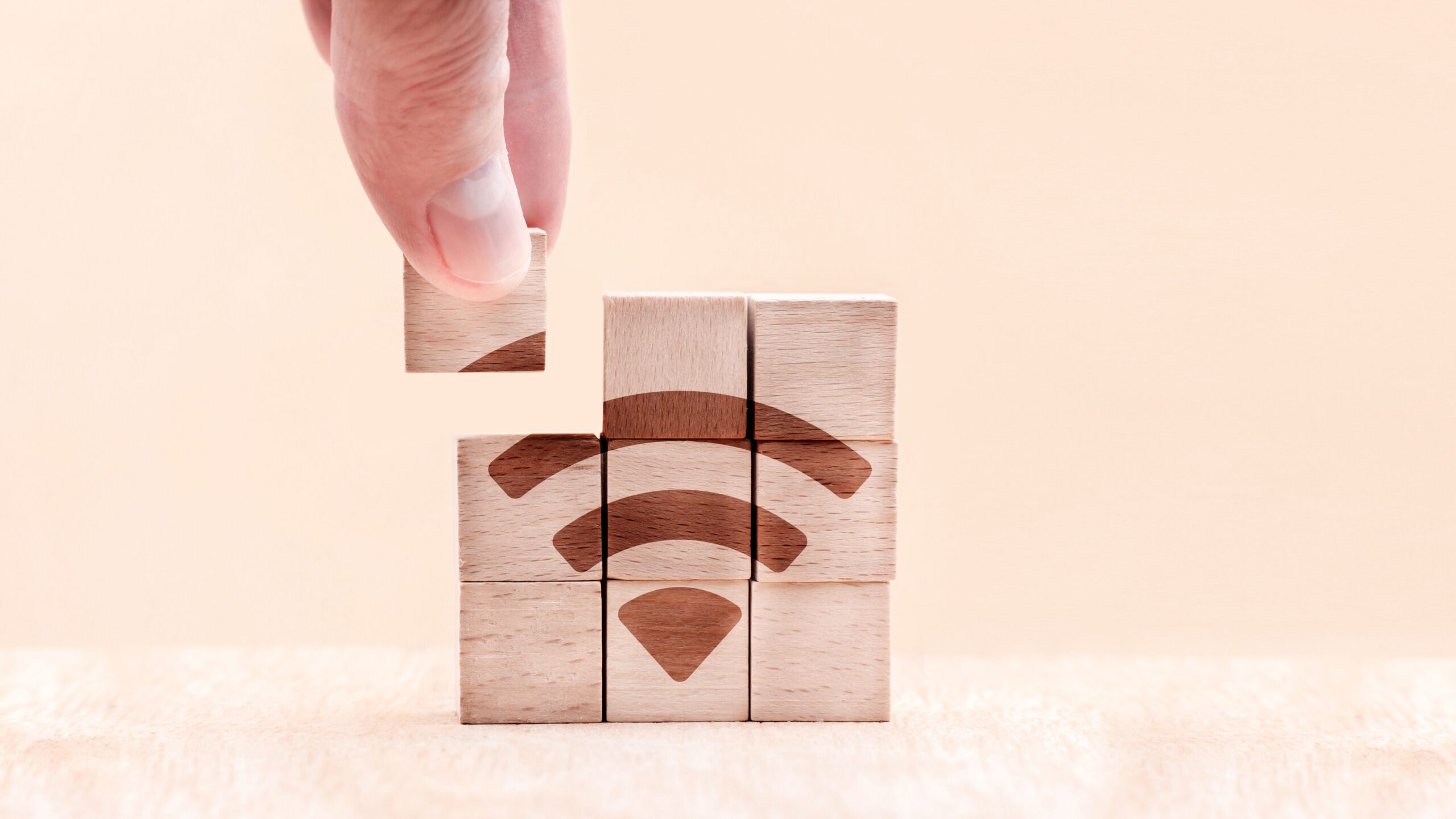 wooden puzzle with wi fi icon