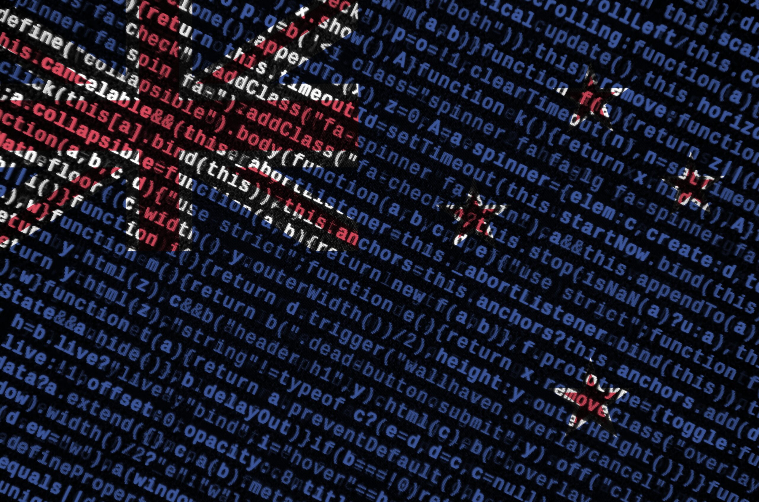 new zealand flag is depicted on the screen with the program code. the concept of modern technology and site development