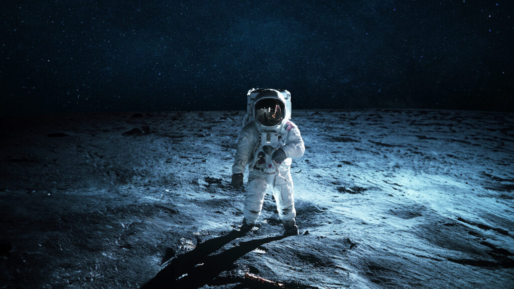 lonely astronaut walks on the lunar surface. lunar mission and e