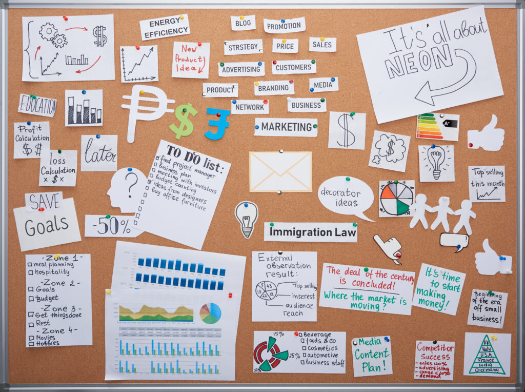 top view of office planning board with cards and notes