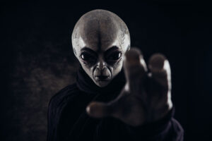 alien creature has a message for humans. grey kind humanoid from