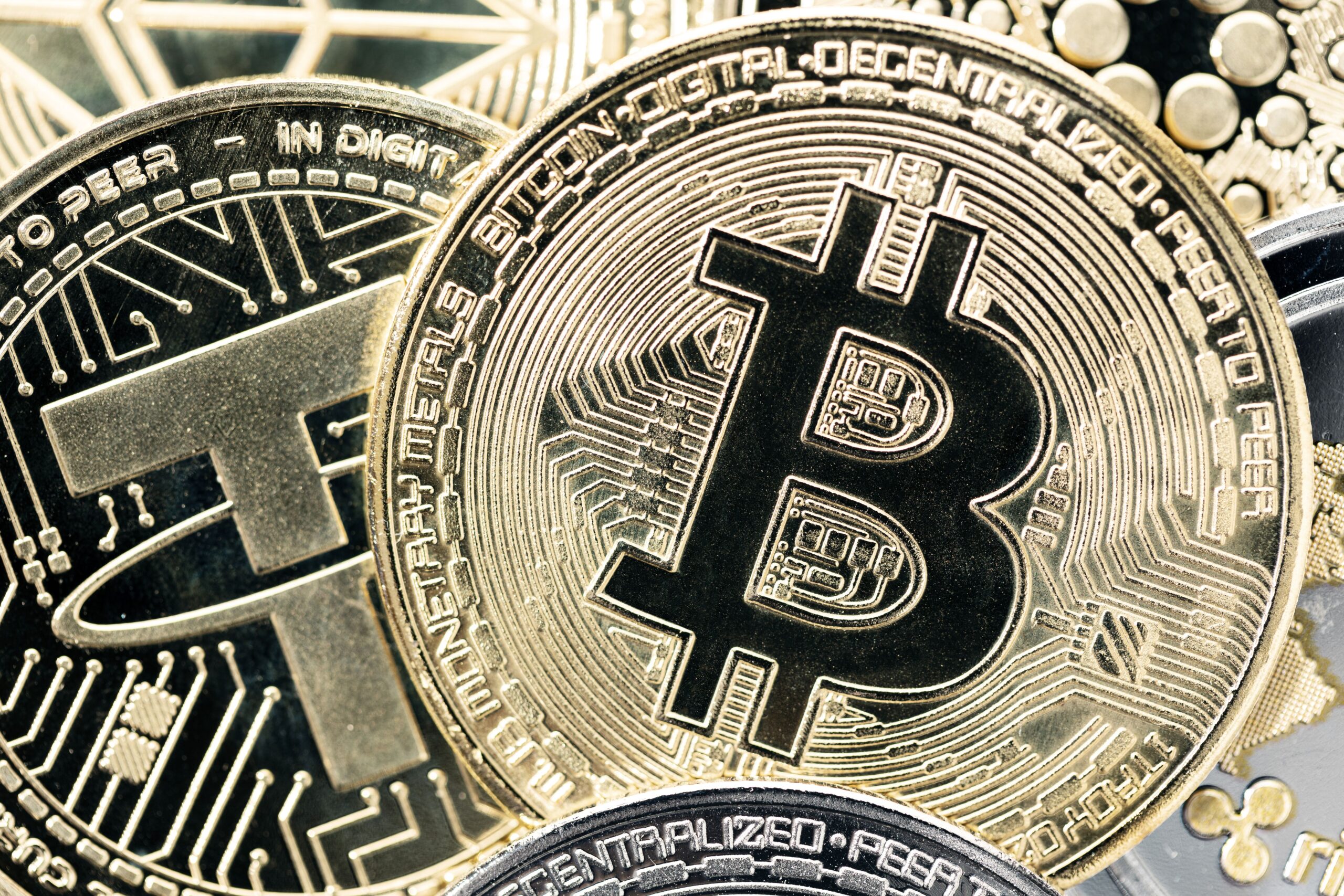 bitcoin coin on a variety of crypto coins background. top view