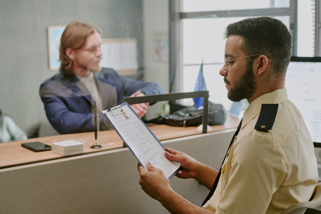 reviewing document at reception desk