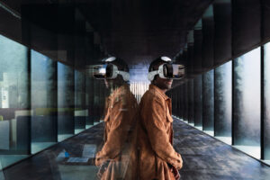 black man exploring cyberspace near glass wall